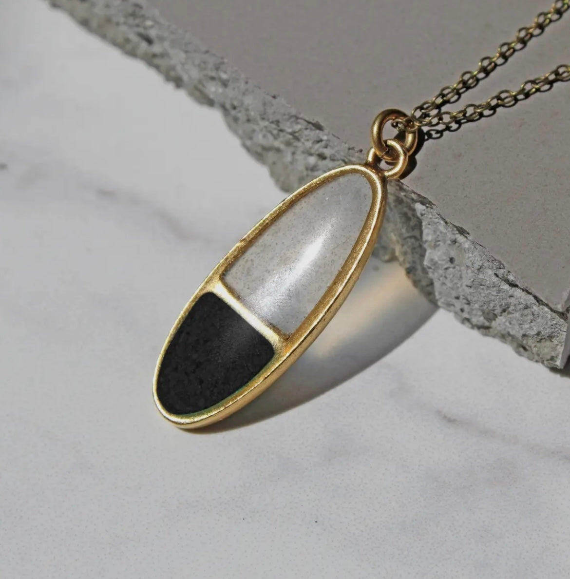 The Poppi Two Tone Oval Pendant Necklace in Black by Cameoko